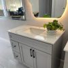 Grey bathroom vanity with drawer storage and marble countertop by Supply Toronto