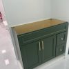 Twilight green bathroom vanity cabinet with gold handles by Supply Toronto