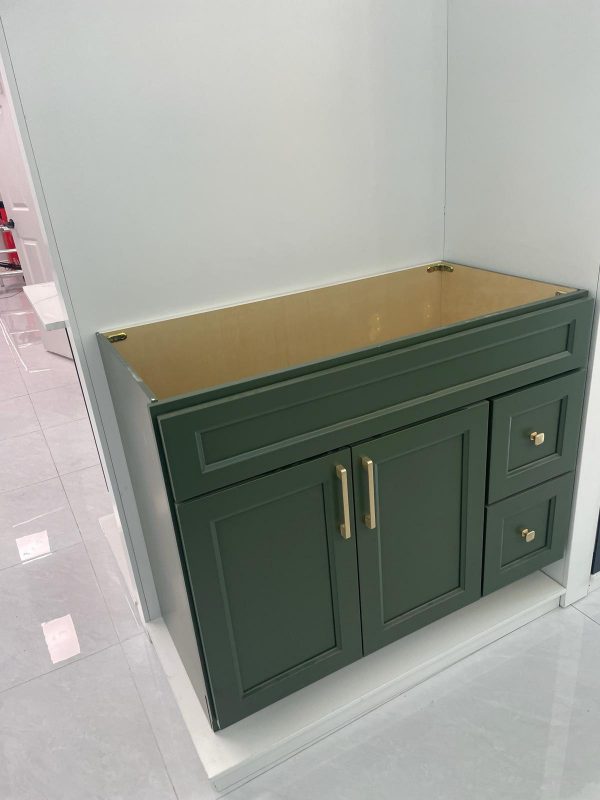 Twilight green bathroom vanity cabinet with gold handles by Supply Toronto