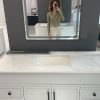 white framed LED bathroom mirror installed in white bathroom Toronto — Supply Toronto
