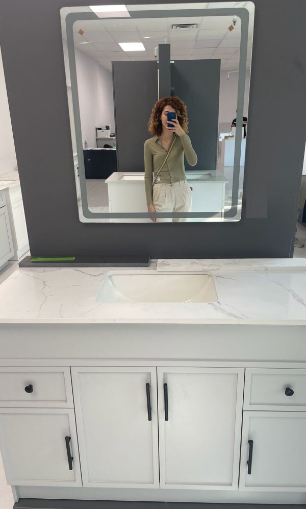 white framed LED bathroom mirror installed in white bathroom Toronto — Supply Toronto
